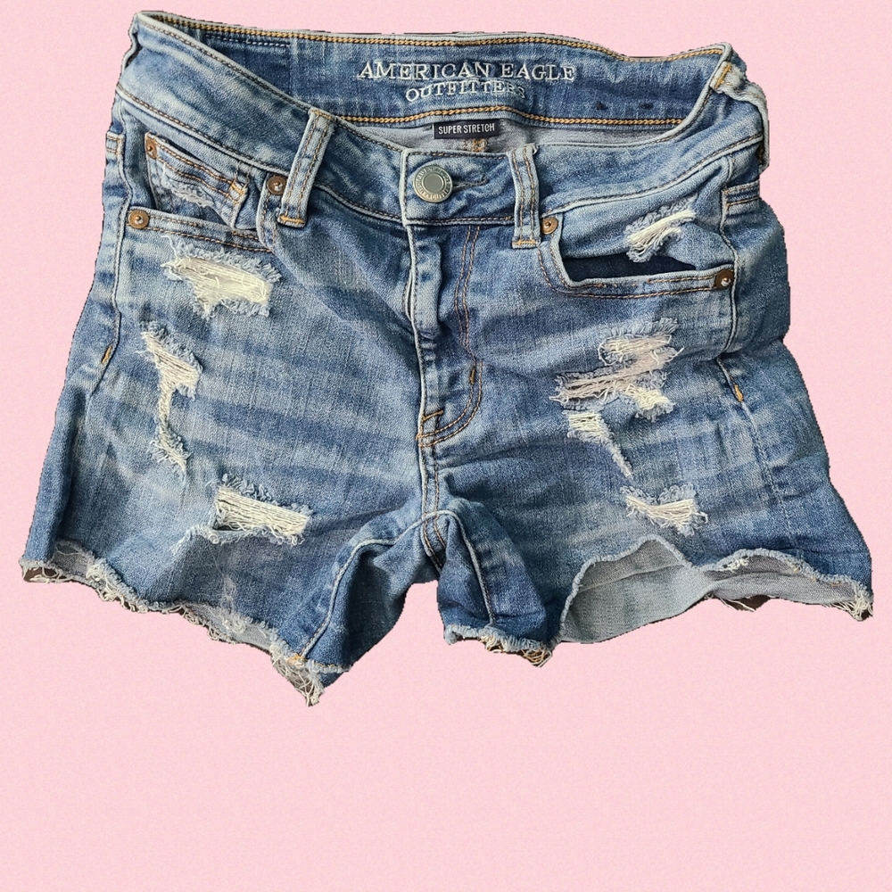 American Eagle women’s Jean shorts hi rise Shortie size 0 blue distress Cut Off